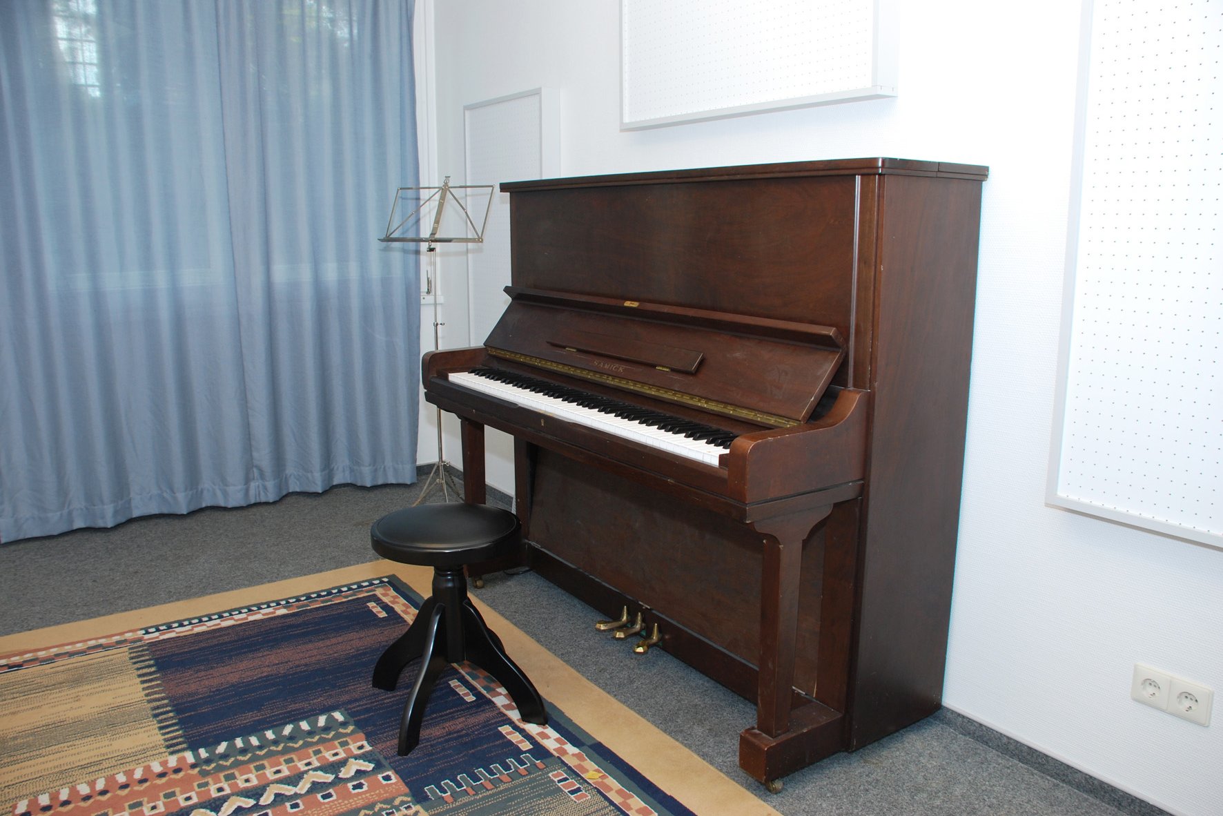Musikraum mit Klavier in der Wohnanlage Lokstedt